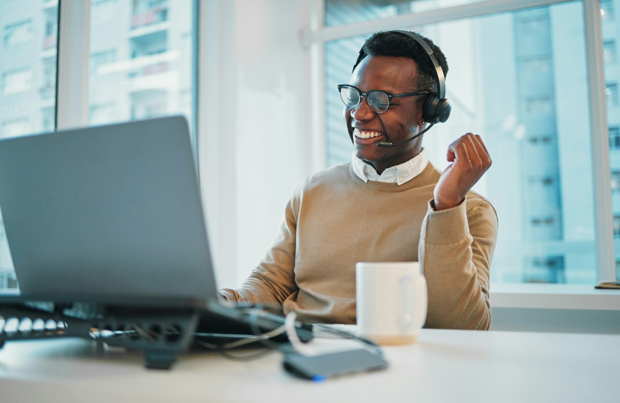 Business man, happy call center and laptop for communication, technical support and online advice.