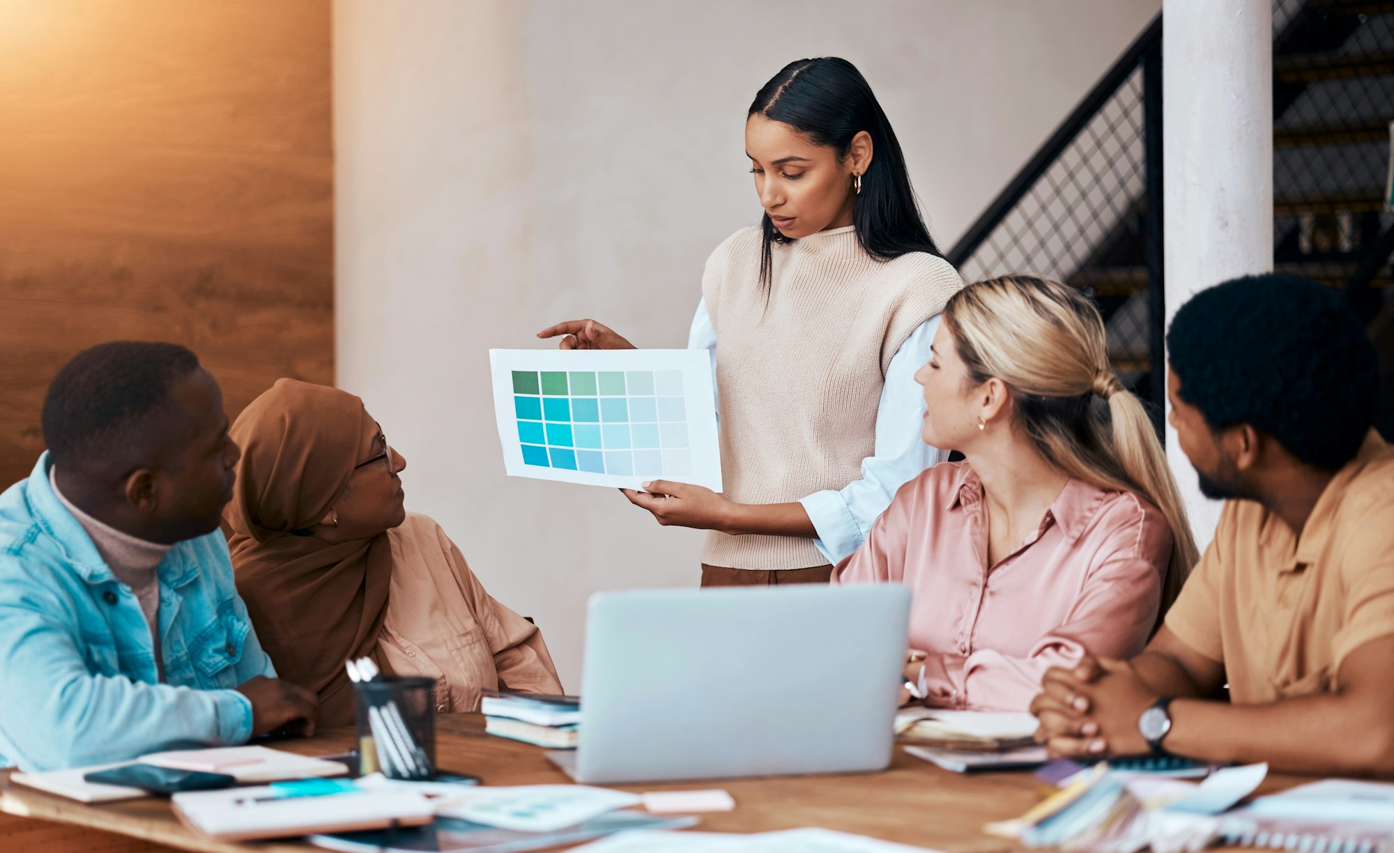 Graphs, strategy and business woman in a presentation talking and planning startup company design.