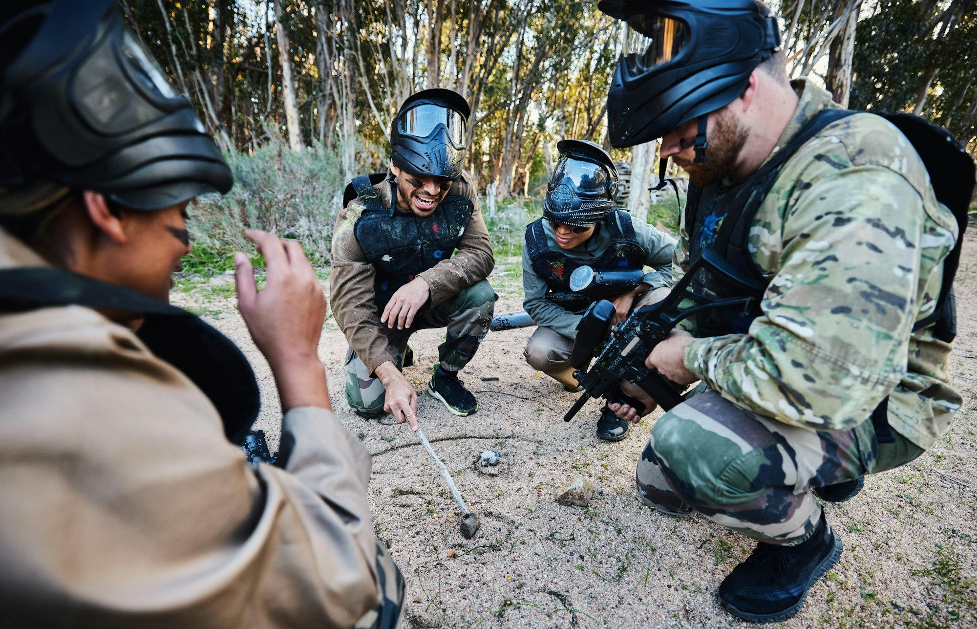 Paintball, team and military strategy with mission, teamwork and war zone with sports outdoor. Sold