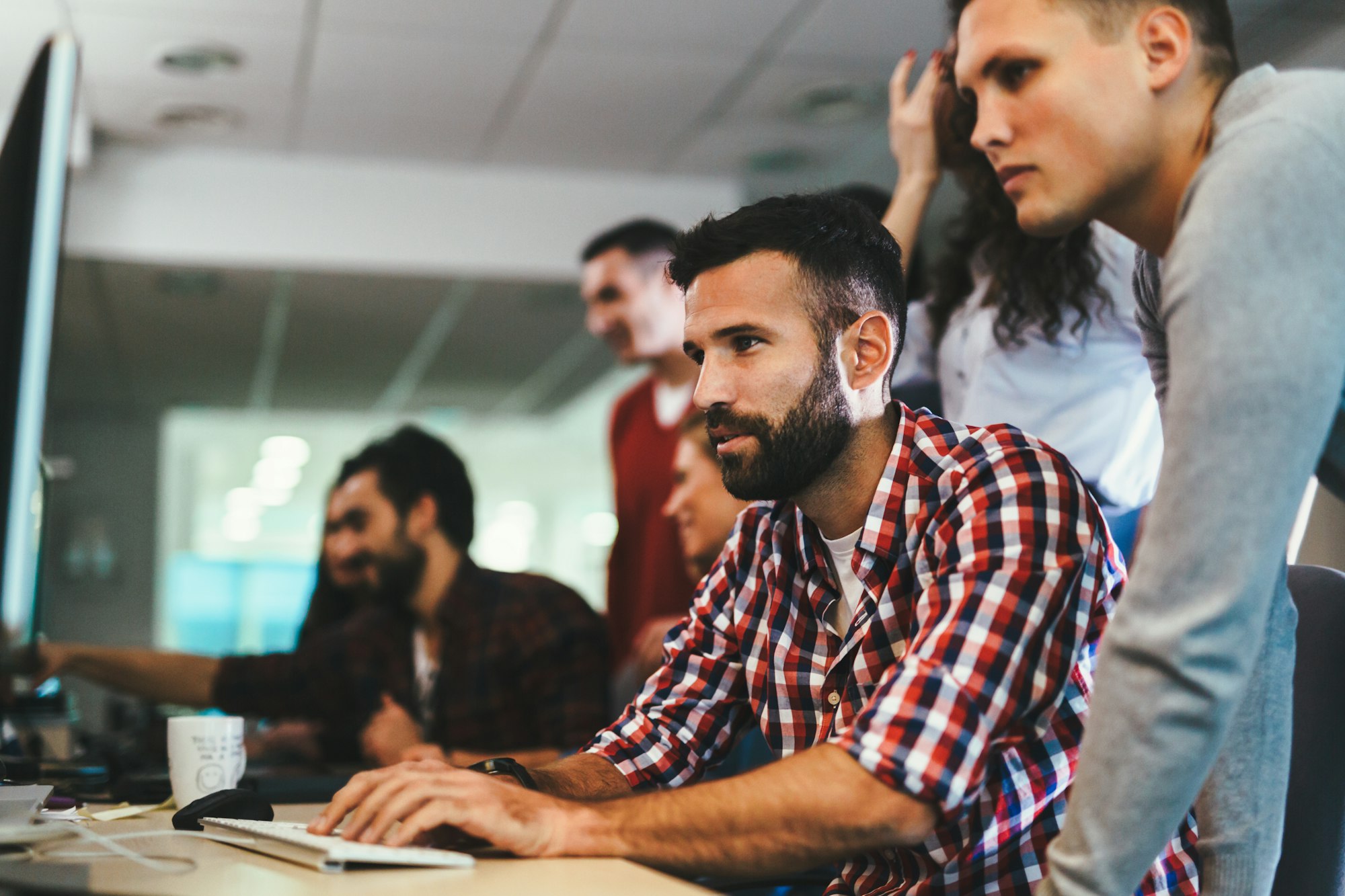 Portrait of programmers working in development software company
